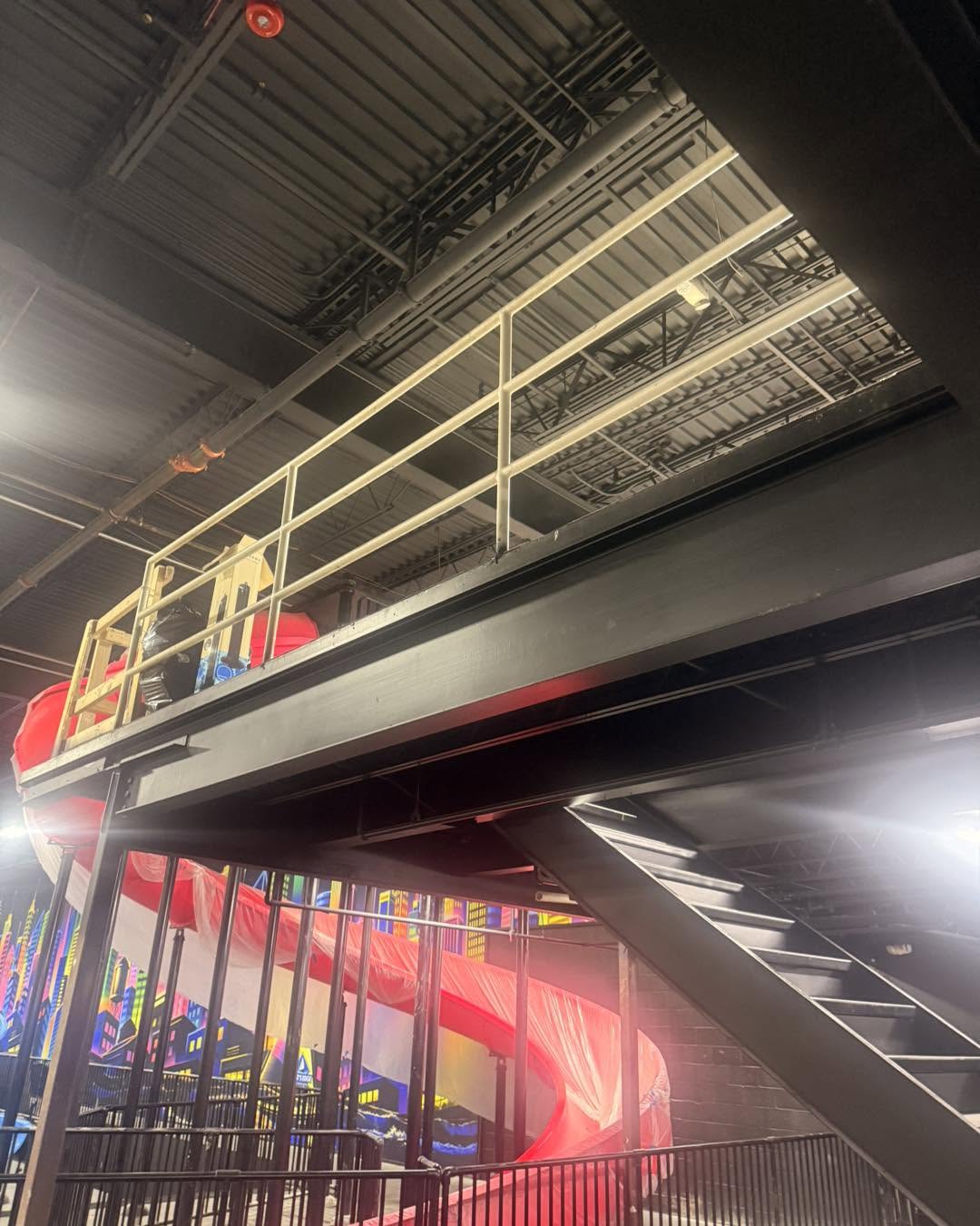 Interior mezzanine and slide structure during demolition-related work